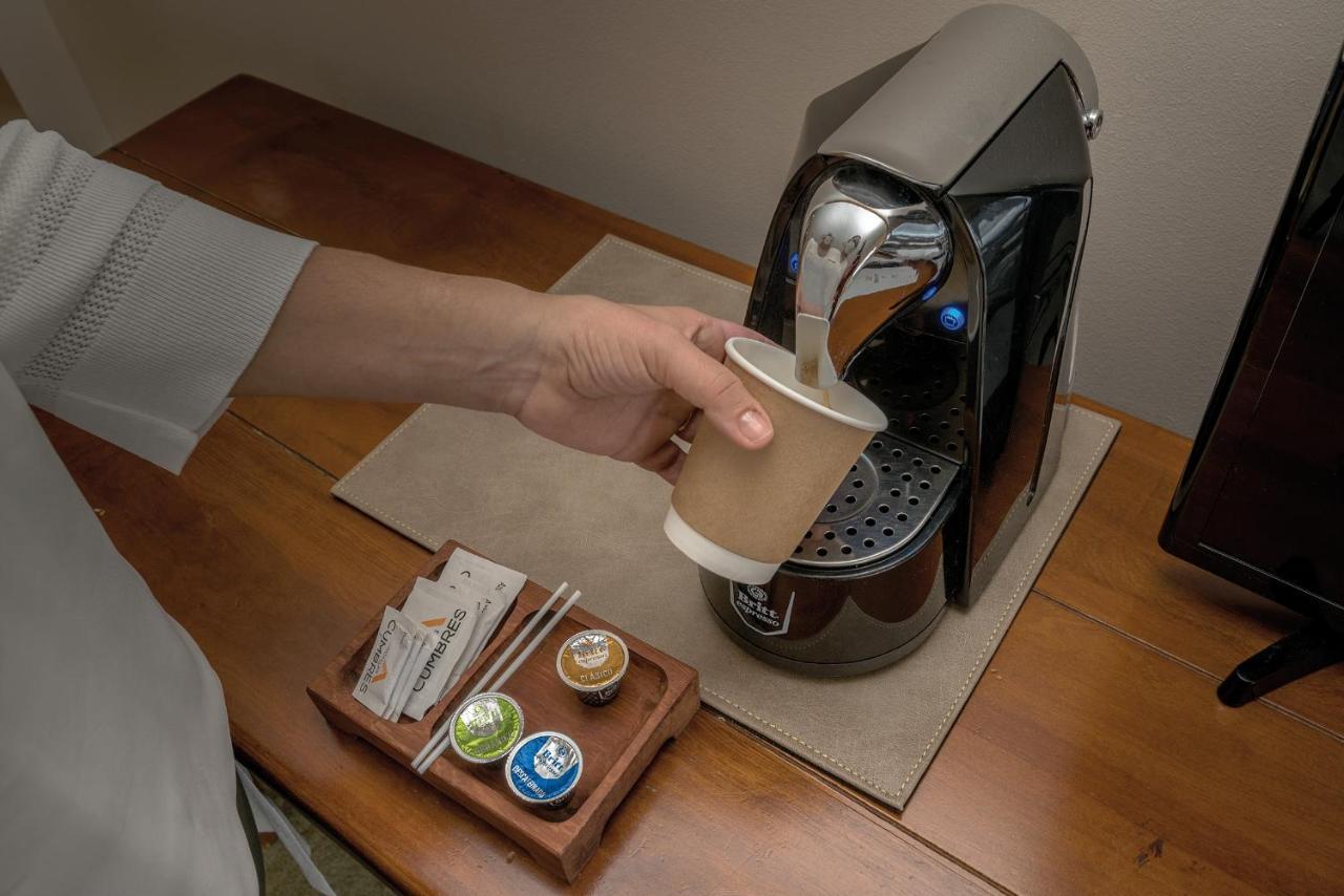 Wyndham Puerto Varas Pettra ภายนอก รูปภาพ A Nespresso coffee machine